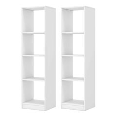 two white bookshelves sitting next to each other