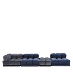 three piece sectional sofa set in blue and grey velvet with matching footstool, viewed from the front