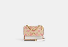 Mini Klare Crossbody In Signature Canvas With Heart Print | COACH OUTLET Expensive Bags, Classy Handbags, Trending Bags, Light Pink Purse, Women Hand Bags, Purse Aesthetic, Aesthetic Designer, Viral Products, Shein Women