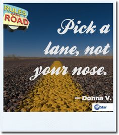 a road with a quote on it that says pick a lane not your nose