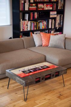 a coffee table sitting on top of a hard wood floor