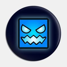 a dark blue button with an angry face on the front and bottom part of it