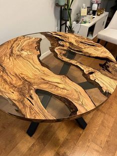 a coffee table made out of wood and glass