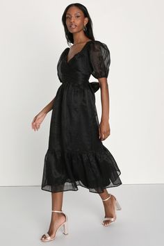 Everyone will want to raise a glass to how cute you are in the Lulus Celebratory Moment Black Surplice Puff Sleeve Midi Dress! Airy woven organza (with an embroidered striped design throughout) shapes this adorable dress that features a crisscrossing surplice bodice framed by puff sleeves with elasticized cuffs. High, fitted waist sits atop a flowy midi skirt with a tiered drop seam. A chic bow detail at back completes the look! Hidden back zipper/clasp. Fit: This garment fits true to size. Leng Black Dress Puffy Sleeves, Black Dress Puffy, Flowy Midi Skirt, Dress Puff Sleeve, Puff Sleeve Midi Dress, Cute Black Dress, Puffy Dresses, Surplice Dress, Lulu Fashion