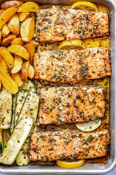 salmon, potatoes and zucchini in a pan