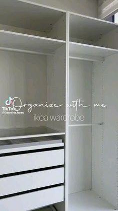 an empty white closet with drawers and shelves