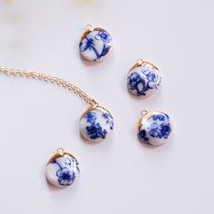 A single, shell-like style of porcelain with a varied, blue and white floral design in this coin pendant necklace. For a clean, everyday look, the white version makes for a classic statement with just enough style. The melted 22k gold is lustered on and melted in a French Tip design. This highlights the slight carved features of this porcelain necklace. Perfect for weddings but frankly, worn daily is just the right touch of sweetly unique for this mini statement piece. Chainware is 14k goldfille French Tip Dip, Clean Everyday, French Tip Design, Porcelain Necklace, White Floral Design, Crescent Necklace, Coin Pendant Necklace, Blue And White Floral, Floral Necklace