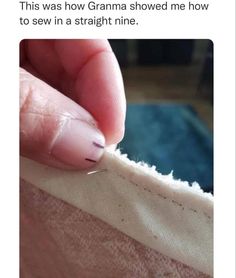 someone is trying to sew the stitches on their left hand and it looks like they are
