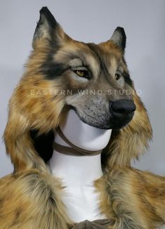 an animal's head is shown on a mannequin with fur collars