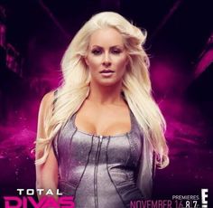 a woman in a silver dress posing for a photo with the words total divas on it