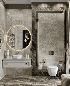 a modern bathroom with marble walls and flooring