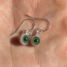 Treat yourself to something fun and spooky today! These eyes are so tiny you have to see them in person to believe the miniscule details. I think it would also be a great gift for any gothic friends you have :) Different materials are available for the ear wire (the hook that goes through the ear), select yours from the drop down menu. Pictured hooks are sterling silver. Spooky Jewelry, Eyeball Earrings, Earrings Gothic, Realistic Eye, Halloween Earrings, Eye Earrings, Dainty Earrings, Earrings Dangle, Pretty Jewellery