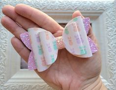 This simple Easter bunny themed hairbow is made from soft faux leather and sparkly chunky glitter. The bow measures 4 inches wide and is securely attached to a 3 inch alligator clip with teeth. Pastel, Bunny Hair Clip, Bunny Hair, Pastel Easter, Best Bow, Easter Girl, Leather Bow, Easy Easter, Leather Bows