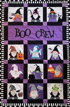 a quilt made to look like it has been decorated with halloween characters and words on it