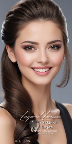 a beautiful young woman with long brown hair wearing a black dress and smiling at the camera