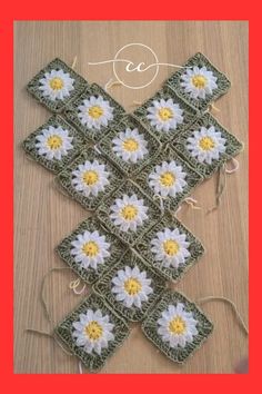 crochet daisy squares are arranged on the table