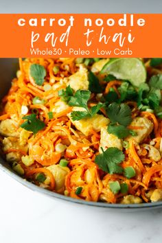 carrot noodle pad thai noodles in a bowl with cilantro garnish