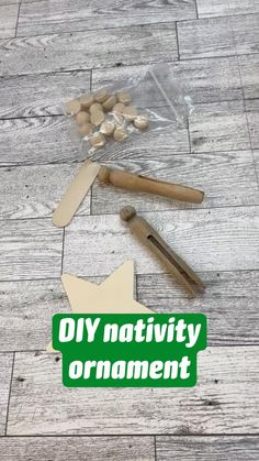 the diy nativity ornament is laying on the floor next to some crafting supplies