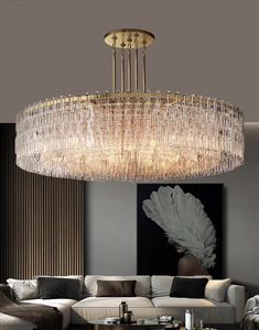 Showcasing the appreciation of minimalism, this luxurious chandelier has a folded form in the traditional shape of round. Translucent crystals fold in circles, diffusing and softening the illumination in a moderate and gentle way, creating an elegant and graceful ambience in any space. Available in two versions of finish: luxurious gold or cool chrome. Extra large size matches with adjustable poles well, is appropriate for large living room, villa, loft, duplex, etc. Voltage 110V-120V/ 220V-240V Circle Chandelier, Modern Hanging Lamp, Acrylic Chandelier, Stainless Steel Lighting, Modern Chandeliers, Bedroom Renovation, Designer Pieces, Rounded Rectangle, Chandelier Style