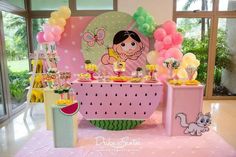 a birthday party with balloons and decorations