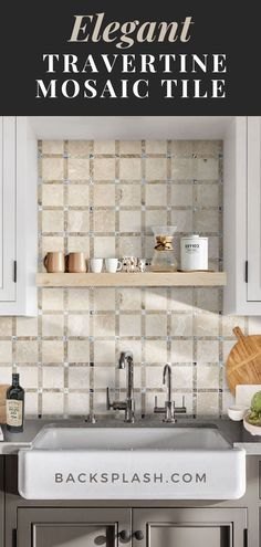 a white kitchen sink sitting next to a counter top with the words elegant traverine mosaic tile on it