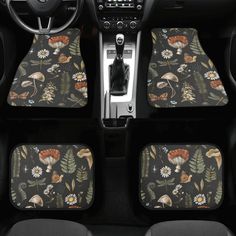 the interior of a car with flowers and mushrooms on it