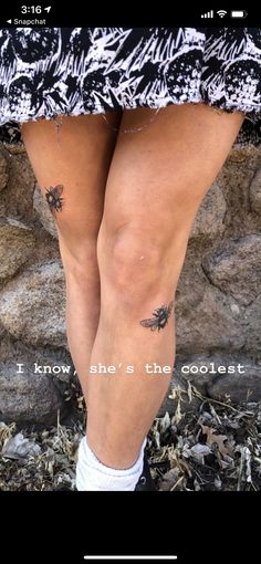 a woman's legs with tattoos on them and the words i know she's the coolest