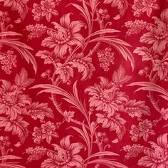 a red floral wallpaper with pink flowers on it