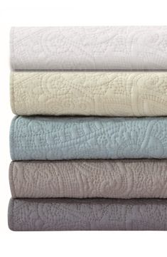 four towels stacked on top of each other