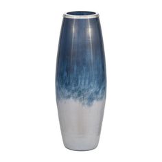 a blue and white vase sitting on top of a table