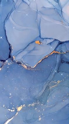 an aerial view of blue and yellow ice