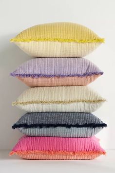 five pillows stacked on top of each other