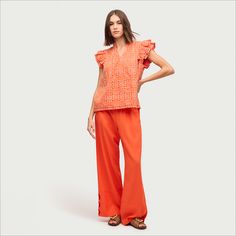 100% Cotton. V-neckline. Pleated ruffle sleeves.  . Tiger Lily, Ruffle Sleeves, Short Sleeve Top, Ruffle Sleeve, Women's Tops, Sam Edelman, Modern Luxury, Short Sleeves Tops, Sleeve Top