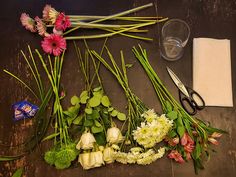 Flower arranging supplies on a table. How To Put Flowers In A Vase, How To Arrange Flowers In A Vase, Arranging Flowers In A Vase, Diy Tall Vase, Arrange Flowers In A Vase, Tall Vase Flower Arrangements, Flower Arrangements Diy Vase, Flower Centerpieces Diy, Diy Floral Centerpieces