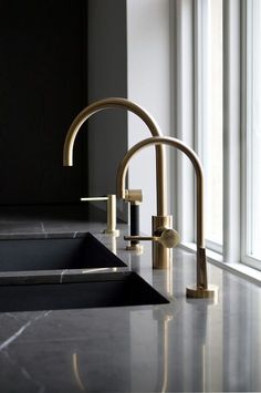 an instagramted photo of two faucets on a counter top with the caption'artisanvillee interior follow '
