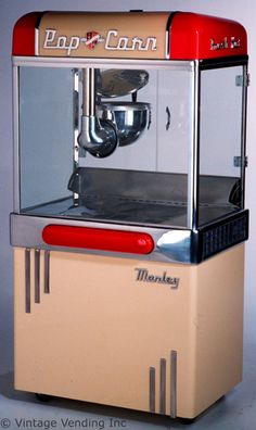 an old - fashioned popcorn machine is on display