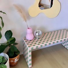 This table is a twist on the classic tile table with a checkered pattern. This is a versatile piece that can be used as a bench or coffee table. The design has a retro feel with the repeating square tiles juxtaposed with clean modern lines. This makes it compatible with many design spaces. For shipping, the tile table will be crated and freight shipped to ensure a safe arrival to its destination. Please let us know the delivery address for accurate shipping prices. We can customize the size of the table along with the tile color and grout color. Send us a message if you would like to design something together.      Measurements 16' tall 16' wide 48'long Tile Desk Top, Pink Tile Coffee Table, Checkered Tile Side Table, Retro Coffee Table Decor, Patterned Coffee Table, Ikea Tile Table, Checkered Tile Table, Coffee Table Maximalist, Tiled Coffee Table Diy