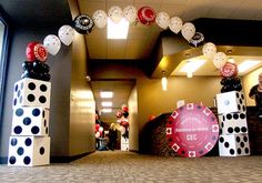 a room filled with lots of balloons and decorations