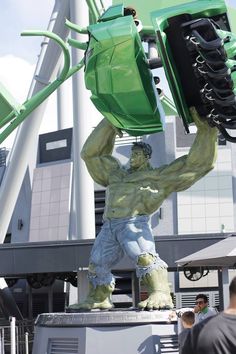 a statue of the incredible hulk with a green bag on it's head and arms