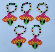 six pieces of beaded bracelets with name tags on them