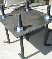 an old table with bolts and screws on it