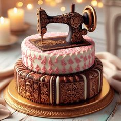 a decorated cake with a sewing machine on it's top and candles in the background