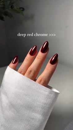 Winter Nails Inspo 2024, Dark Oval Acrylic Nails, Burgundy Chrome Nails Designs, Red Nail Black French Tip, Dark Red Wine Nails, Black Red Nails Short, Cateye Red Nails, Wine Red Chrome Nails, White Cateye Nail