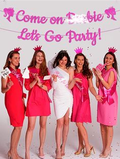 a group of women standing next to each other in front of a sign that says, come on be let's go party