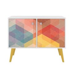 a cabinet with colorful geometric designs on the doors