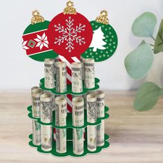 a christmas ornament made out of dollar bills