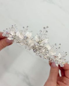 Juliet's delicate shimmering branches & ivory metal leaves make this flower crown one that will sparkle long after your wedding day. Hand crafted with metal leaves, genuine crystal beads & gemstones. Measures 1.5 inches at the center peak. Lightweight & easy to style. Style #3283 Wedding Tiaras, Fairy Wedding Crown, Fairy Tiara, Bride Hairstyles Updo, Wedding Tiara Veil, Wedding Crown Tiara, Gold Wedding Crowns, Bridal Crowns, Bridal Veils And Headpieces