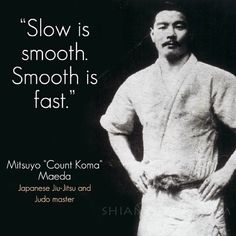 a man standing in front of a black background with the words slow is smooth smooth is fast