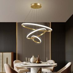 a modern dining room with round table and chairs