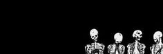 three skeletons standing in the dark with their heads turned to look like they are looking at something